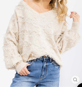 Fun, fringy, and super soft sweater